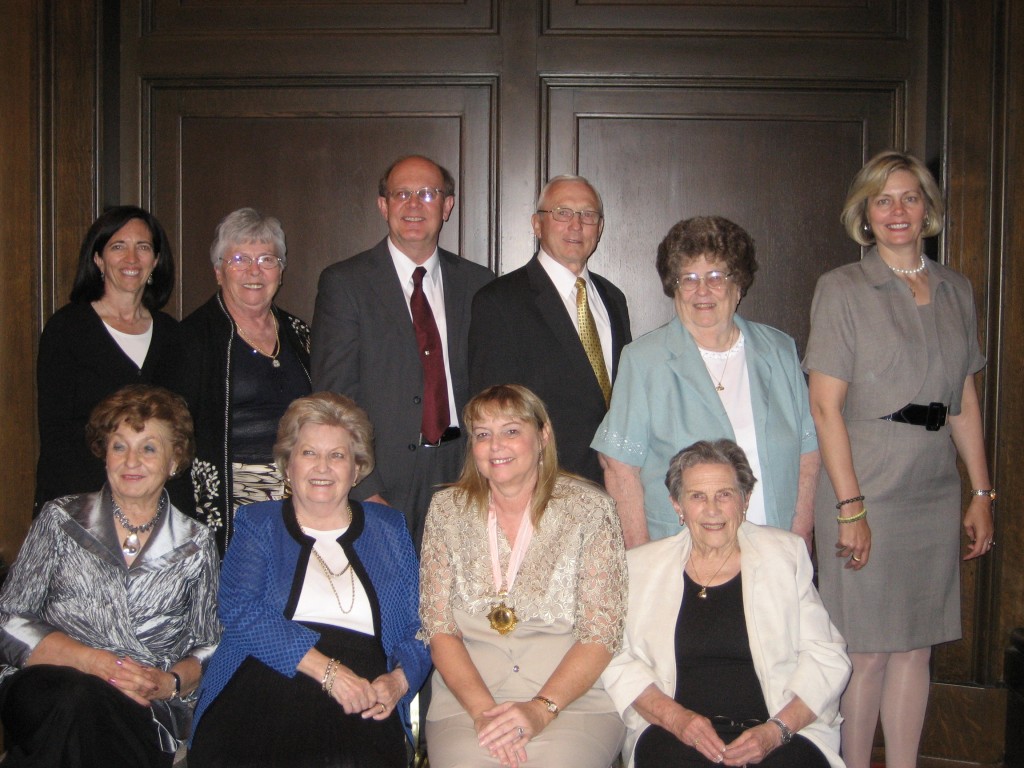 Governor Swan with board members of the Utah Mayflower Society. Front row Left to Right: Marion Harrison (Treasurer), Elaine Holbrook (Governor), Judith Swan (Governor General), Fern Nichols (Secretary); Back row L to R: Janis Rowser (Junior Chairperson), Prisicilla Haines (Historian), Kirk Hagen (Deputy Governor General), James Smedley (Councilor), Lois Oakes (Editor), Stephanie Weaver (Captain).